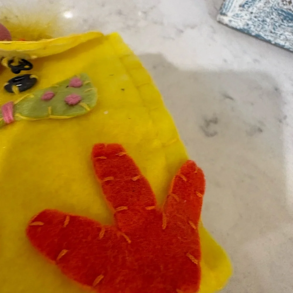 Kids Yellow Bunny Sunglasses and 2 felt bags each with a plastic egg